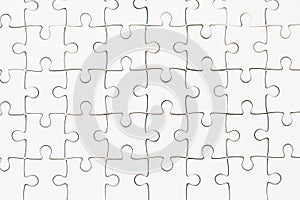 White jigsaw puzzle pattern background. Jigsaw backdrop for web site, marketing, app and logo template. Creative art concept,