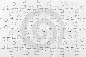 White jigsaw puzzle pattern isolated full background