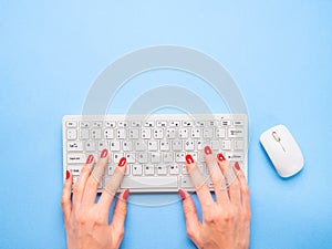 White keyboard on minimal blue background