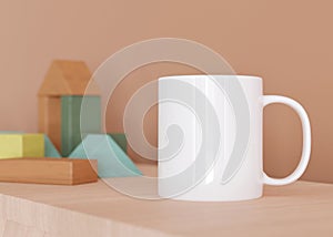 White kids mug mock up. Blank template for your design, advertising, logo. Close-up view. Copy space. Cup standing in