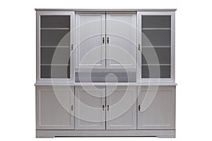 White kitchen cabinet with glass doors. Classical furniture made of natural wood.