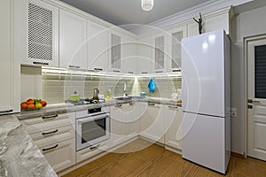 White kitchen in classic style