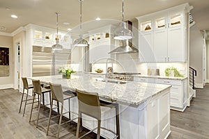 White kitchen design in new luxurious home