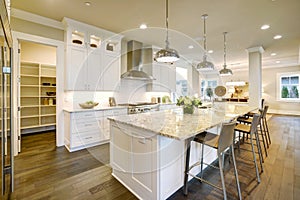 White kitchen design in new luxurious home