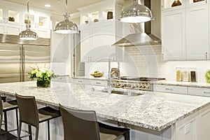 White kitchen design in new luxurious home