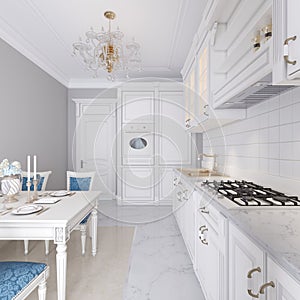 White kitchen with dining table in a classic style. The bright interior of the kitchen