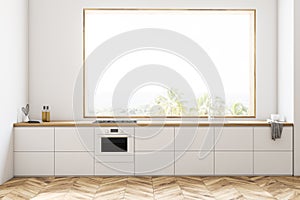 White kitchen interior with white countertops