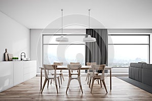 White kitchen interior, wooden table and windows