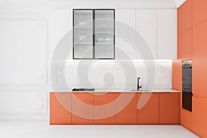 White kitchen with orange countertops