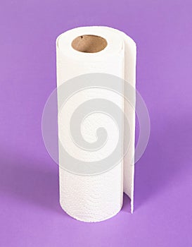 White kitchen paper isolated on purple background