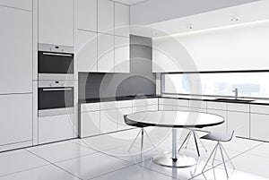 White kitchen with a round table