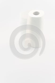 white kitchen tissue paper roll on a white surface