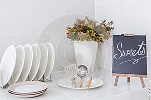 White kitchen with utensil