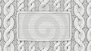 White knitted fabric background with a rectangular frame for text