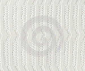White Knitted Fabric Texture.White knitted carpet closeup.