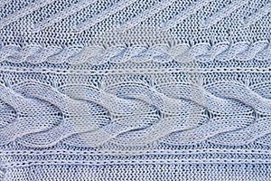 White knitted sweater background. Top view. Copy space