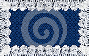 White lace on background blue guipure