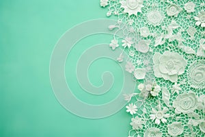 White lace border with flowers on green background with copy space. Generative AI
