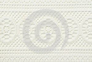 White lace fabric with abstract pattern