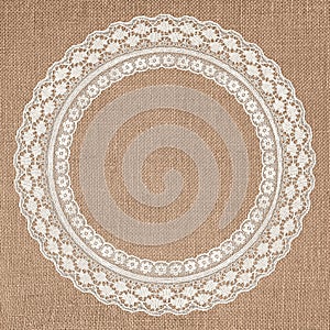 White Lace Frame on Brown Burlap Texture