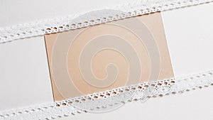 White lace tape on white surface with brown blank center