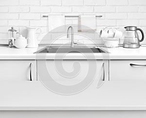 White laminated table on blurred rustic kitchen sink interior background