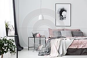 Poster in pink bedroom interior photo