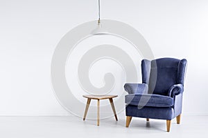 Classic armchair in white room photo