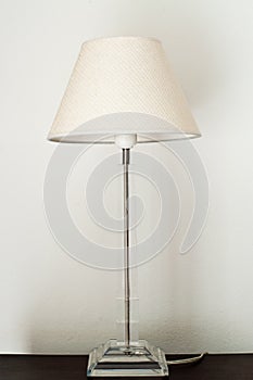 White lamp on the blown table