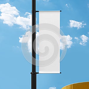 White Lamp Post Banner Mockup, blank advertisment 3d Rendering with Blue Sky background photo