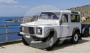 White Land Rover Defender on holiday