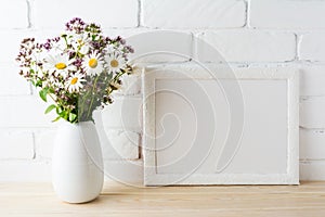 White landscape frame mockup with blooming wildflower bouquet in