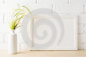 White landscape frame mockup with yellow and green wild grass ea
