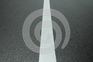 White lane markings on paved roads