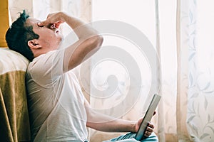 Latin young man working from home, teleworking photo