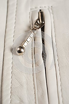 White leather jacket zipper