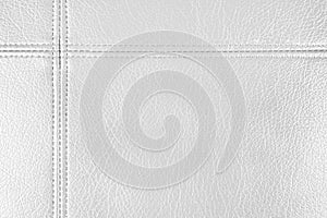 White leather, leatherette texture background wtih decorative stich