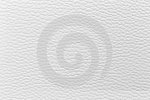 The white leather texture is used as a luxury classic background