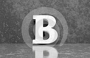 White letter B on concrete wall an floor background