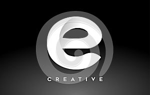 White Letter E Logo Design with Minimalist Creative Look and soft Shaddow on Black background Vector