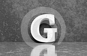 White letter G on concrete wall an floor background