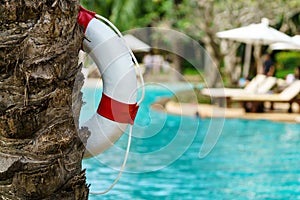 White lifebuoy at swimming pool