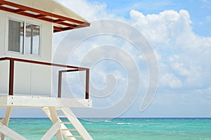 White Lifeguard house on a beach
