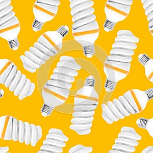 White light bulbs on a yellow background. Seamless pattern for textile