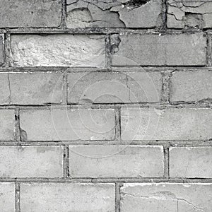 White light grey old aged weathered fine brick wall texture, grungy damaged calcium silicate bricks pattern detail background