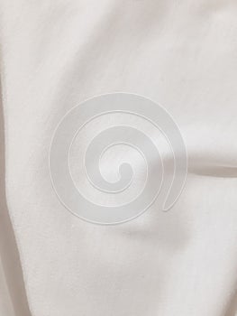 White light soft fabric with folds. Background design, photography. Textile, fabric template, modern new