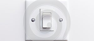 A white light switch on a wall