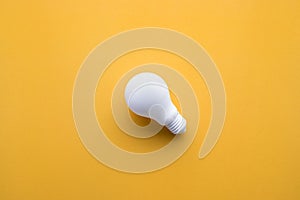 White lightbulb on color background.Ideas creativity
