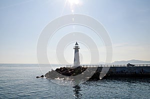 White lighthouse at the breakwater of Cheongsapo port, Busan, South Korea