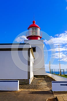 White lighthouse on a coast of Madeira